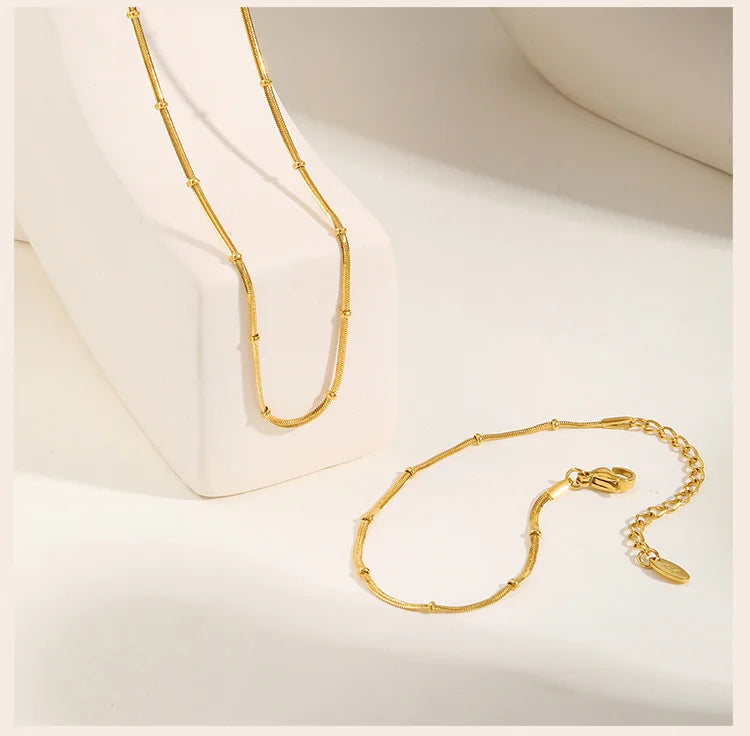 Serpella Glow – Gold-Plated Snake Bead Bracelet