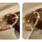 Virelia Weave – Gold-Plated Woven Cuff Bracelet