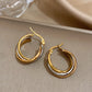 Trivelle – Sculptural Tri-Tone Twisted Hoop Earrings