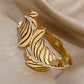 Featherelle – Elegant Gold-Plated Feather & Rhinestone Cuff Bracelet
