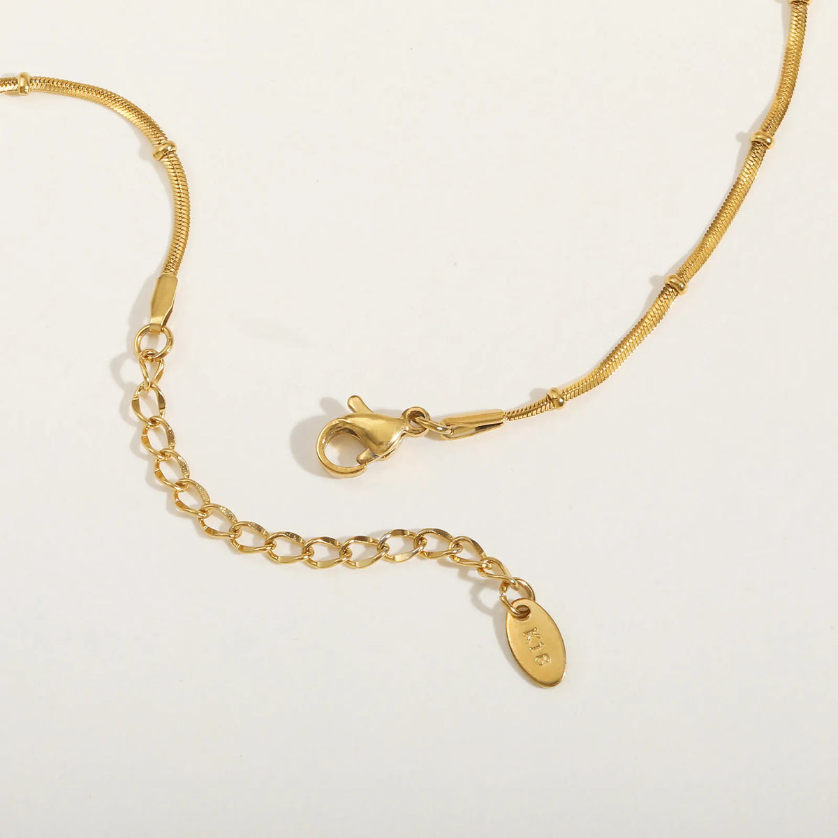 Serpella Glow – Gold-Plated Snake Bead Bracelet